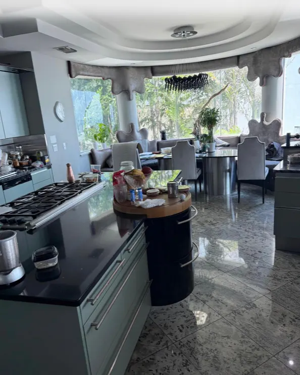 Before: Kitchen with backlit stone island